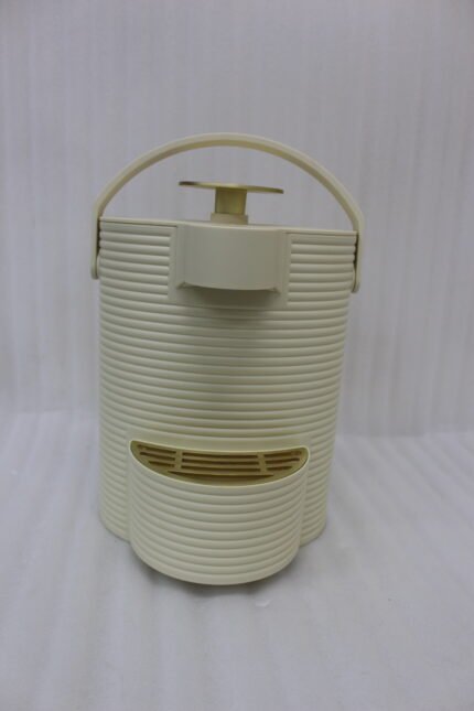 Modern cream-colored 2L ribbed water dispenser pitcher with gold accents and carrying handle on a marble kitchen countertop.