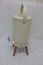 Modern 5L cream beverage dispenser with wooden legs, digital temperature display, and chrome spigot sitting on a marble kitchen countertop.