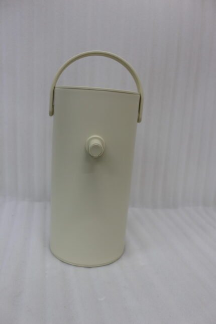 Minimalist off-white 2L insulated thermal water pitcher with carrying handle and dispenser spout on a marble kitchen countertop.