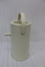 Minimalist off-white 2L insulated thermal water pitcher with carrying handle and dispenser spout on a marble kitchen countertop.