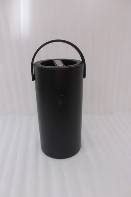 Matte black 2L bumper buffet burner holder with top handle placed on a kitchen countertop