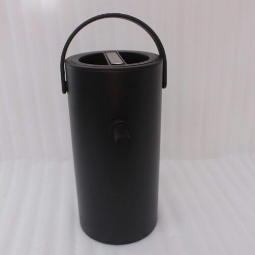 Matte black 2L bumper buffet burner holder with top handle placed on a kitchen countertop