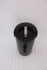 Matte black 2L bumper buffet burner holder with top handle placed on a kitchen countertop