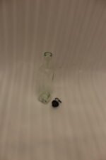 2 Pcs transparent glass oil dispenser bottles with stainless steel leak-proof pour spouts set on a marble kitchen counter