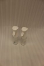 2 Pcs clear glass oil sprayer bottle set with ergonomic white trigger nozzles on a kitchen countertop