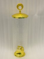 Luxury 3.5L amber ribbed glass beverage dispenser with ornate gold base, spigot, and lid handle on a kitchen countertop.