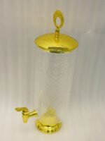 Luxury 3.5L amber ribbed glass beverage dispenser with ornate gold base, spigot, and lid handle on a kitchen countertop.