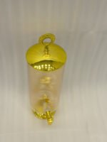 Luxury 3.5L amber ribbed glass beverage dispenser with ornate gold base, spigot, and lid handle on a kitchen countertop.