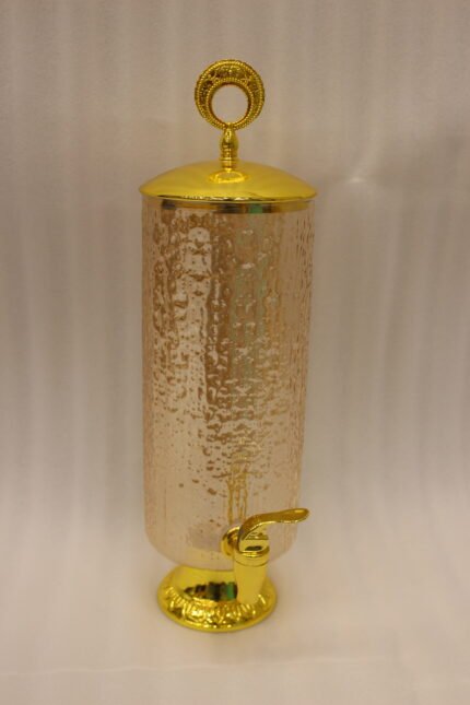 3.5-liter clear hammered glass beverage dispenser with polished gold lid ring handle and spigot on a kitchen counter