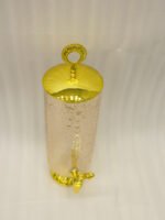 3.5-liter clear hammered glass beverage dispenser with polished gold lid ring handle and spigot on a kitchen counter