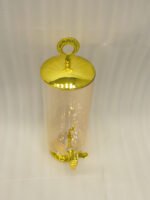 3.5 liter ribbed glass beverage dispenser with polished gold base, lid, and spigot on a kitchen counter