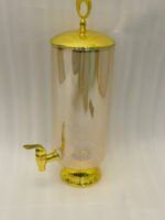 3.5 liter ribbed glass beverage dispenser with polished gold base, lid, and spigot on a kitchen counter