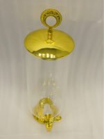 3.5 liter ribbed glass beverage dispenser with polished gold base, lid, and spigot on a kitchen counter