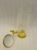 3.5 liter ribbed glass beverage dispenser with polished gold base, lid, and spigot on a kitchen counter