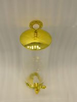 3.5 liter ribbed glass beverage dispenser with polished gold base, lid, and spigot on a kitchen counter