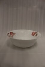 38 piece opal glass dinner set with vintage floral rose patterns on a wooden dining table