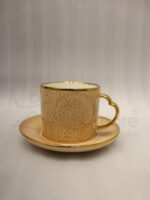 Elegantly boxed beige ceramic 6-person cup and saucer set featuring textured patterns and gold trim handles.