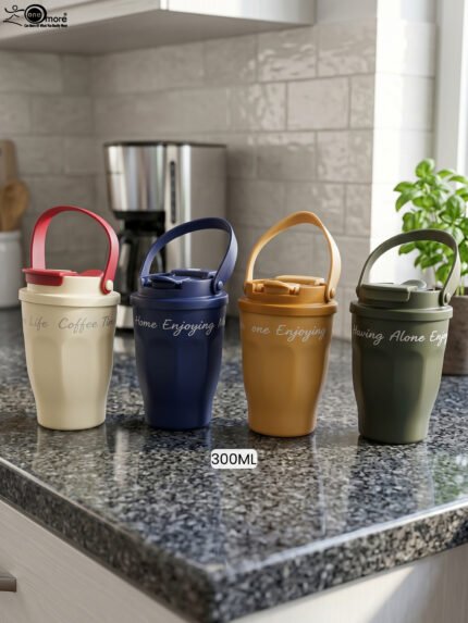 Four 300ml portable travel coffee mugs in cream, navy blue, mustard yellow, and olive green with top carrying handles placed on a kitchen countertop.