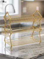 3-tier modern gold stainless steel dish drying rack with utensil basket, cup holder, and clear drip tray on a marble countertop