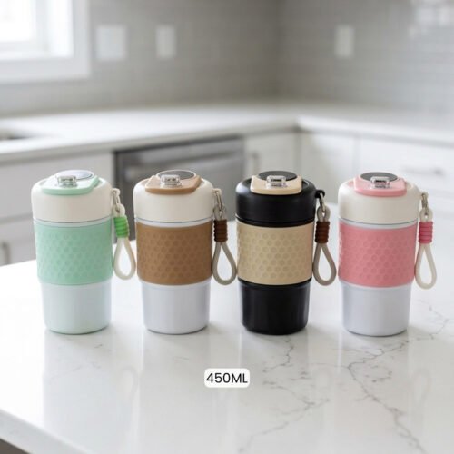 Four 450ml insulated travel coffee mugs in mint green, brown, black, and pink with textured silicone grips and wrist straps on a kitchen counter