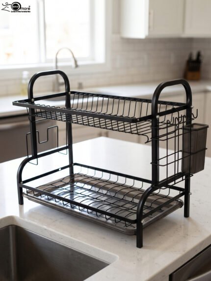2-tier black metal dish drying rack with removable drain tray and side utensil holder on a kitchen countertop