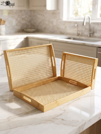 3 piece natural wooden serving tray set with woven cane rattan mesh bottom and side handles on a kitchen countertop