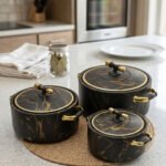 ONEMORE 3-piece black and gold marble pattern insulated hot pot set in 1L, 2L, and 3.5L capacities displayed on a kitchen counter