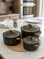 ONEMORE 3-piece black and gold marble pattern insulated hot pot set in 1L, 2L, and 3.5L capacities displayed on a kitchen counter