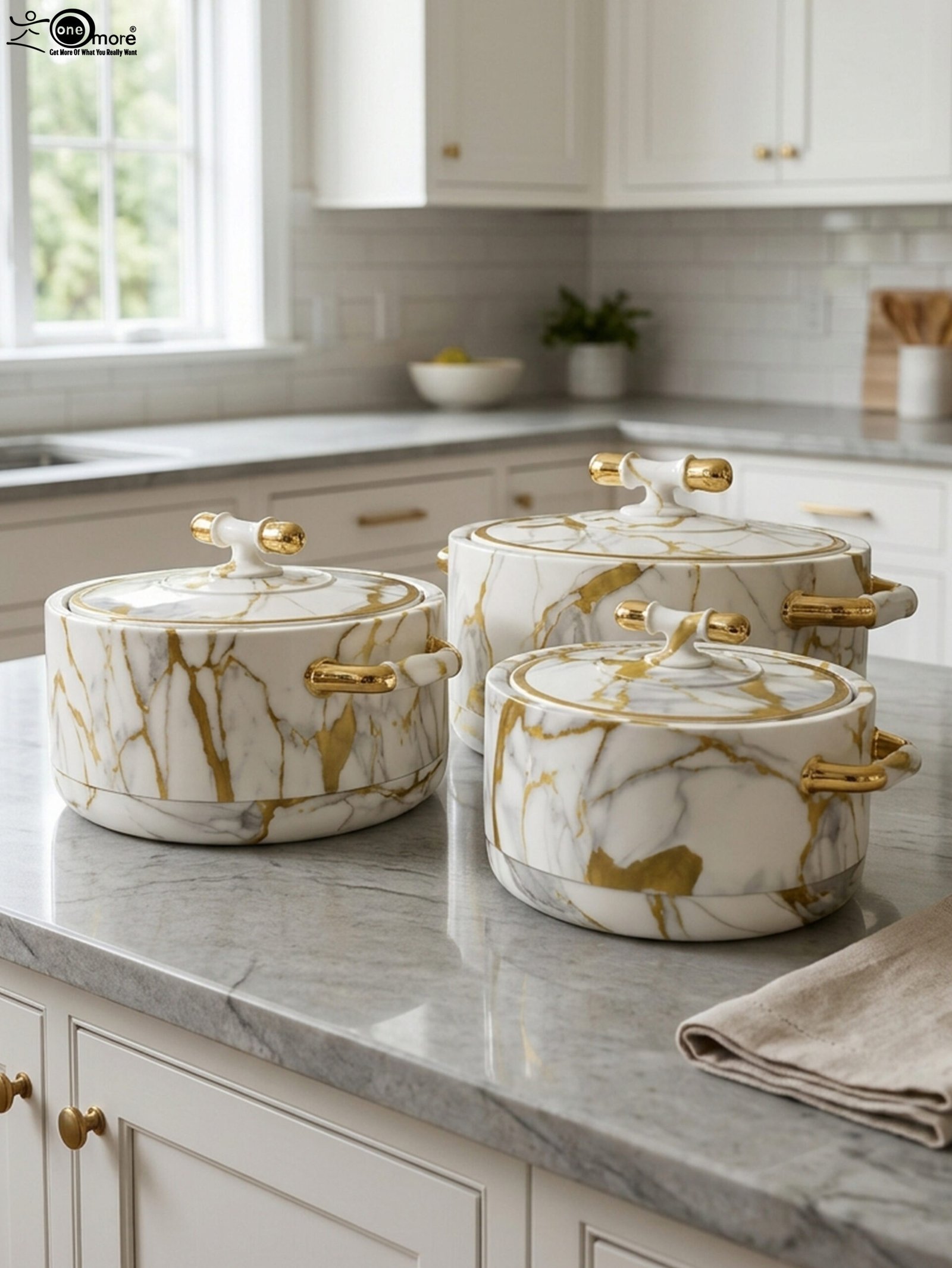 1 ONEMORE 3-piece luxury white and gold marble pattern hot pot set with gold handles on a marble kitchen countertop.