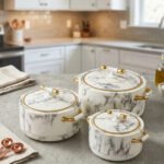 3-piece white marble finish insulated hot pot set with gold handles and lid trim in 1L, 2L, and 3.5L sizes