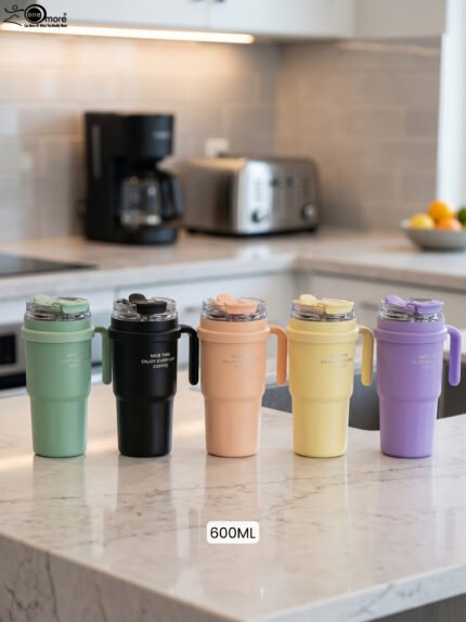 Lineup of five 600ml insulated travel coffee tumblers with handles in green, black, peach, yellow, and purple.