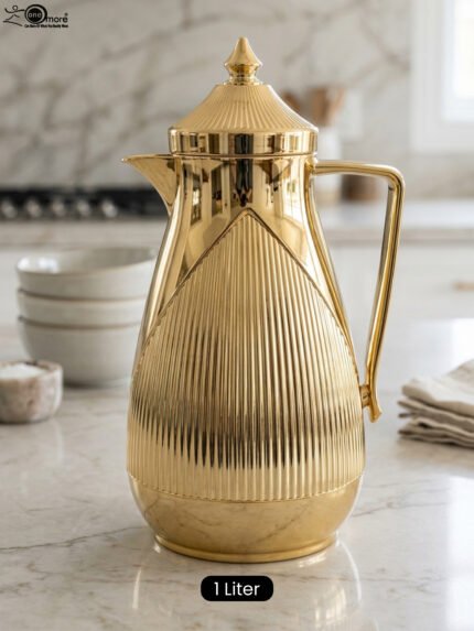 1-Liter metallic gold insulated vacuum flask with fluted ribbed design on a marble countertop