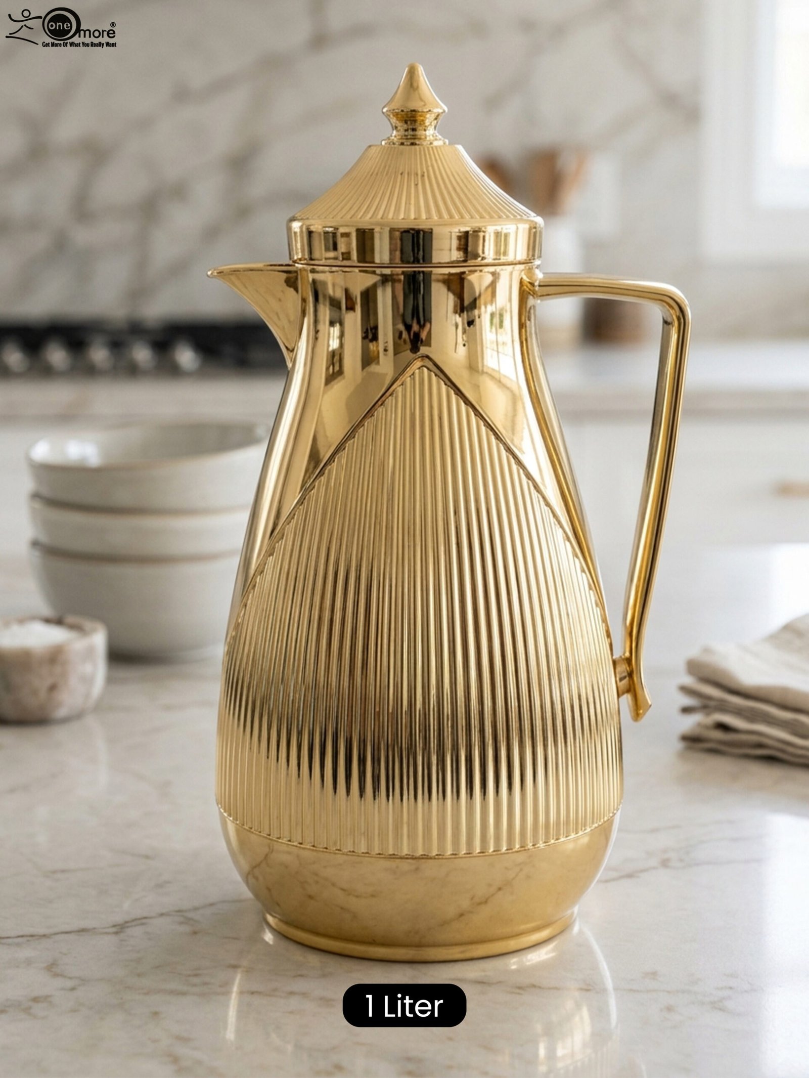 1 1-Liter metallic gold insulated vacuum flask with fluted ribbed design on a marble countertop