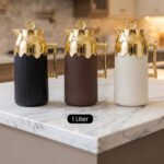 Three One More 1 Liter luxury thermal vacuum flasks in black, brown, and cream with fluted ribbed bodies, ornate gold handles, and gold crown tops on a marble kitchen counter.Three One More 1 Liter luxury thermal vacuum flasks in black, brown, and cream with fluted ribbed bodies, ornate gold handles, and gold crown tops on a marble kitchen counter.Three One More 1 Liter luxury thermal vacuum flasks in black, brown, and cream with fluted ribbed bodies, ornate gold handles, and gold crown tops on a marble kitchen counter.Three One More 1 Liter luxury thermal vacuum flasks in black, brown, and cream with fluted ribbed bodies, ornate gold handles, and gold crown tops on a marble kitchen counter.Three One More 1 Liter luxury thermal vacuum flasks in black, brown, and cream with fluted ribbed bodies, ornate gold handles, and gold crown tops on a marble kitchen counter.