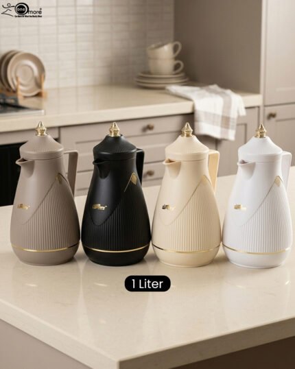 Four One More 1-liter thermal vacuum tea and coffee flasks in taupe, matte black, cream, and white with elegant gold accents on a modern kitchen counter.Four One More 1-liter thermal vacuum tea and coffee flasks in taupe, matte black, cream, and white with elegant gold accents on a modern kitchen counter.