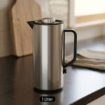 One More 1 Liter brushed stainless steel thermal vacuum flask with a black handle and pour spout on a kitchen countertop.One More 1 Liter brushed stainless steel thermal vacuum flask with a black handle and pour spout on a kitcheOne More 1 Liter brushed stainless steel thermal vacuum flask with a black handle and pour spout on a kitchen countertop.One More 1 Liter brushed stainless steel thermal vacuum flask with a black handle and pour spout on a kitchen countertop.One More 1 Liter brushed stainless steel thermal vacuum flask with a black handle and pour spout on a kitchen countertop.One More 1 Liter brushed stainless steel thermal vacuum flask with a black handle and pour spout on a kitchen countertop.One More 1 Liter brushed stainless steel thermal vacuum flask with a black handle and pour spout on a kitchen countertop.One More 1 Liter brushed stainless steel thermal vacuum flask with a black handle and pour spout on a kitchen countertop.One More 1 Liter brushed stainless steel thermal vacuum flask with a black handle and pour spout on a kitchen countertop.One More 1 Liter brushed stainless steel thermal vacuum flask with a black handle and pour spout on a kitchen countertop.One More 1 Liter brushed stainless steel thermal vacuum flask with a black handle and pour spout on a kitchen countertop.One More 1 Liter brushed stainless steel thermal vacuum flask with a black handle and pour spout on a kitchen countertop.One More 1 Liter brushed stainless steel thermal vacuum flask with a black handle and pour spout on a kitchen countertop.One More 1 Liter brushed stainless steel thermal vacuum flask with a black handle and pour spout on a kitchen countertop.One More 1 Liter brushed stainless steel thermal vacuum flask with a black handle and pour spout on a kitchen countertop.One More 1 Liter brushed stainless steel thermal vacuum flask with a black handle and pour spout on a kitchen countertop.One More 1 Liter brushed stainless steel thermal vacuum flask with a black handle and pour spout on a kitchen countertop.One More 1 Liter brushed stainless steel thermal vacuum flask with a black handle and pour spout on a kitchen countertop.One More 1 Liter brushed stainless steel thermal vacuum flask with a black handle and pour spout on a kitchen countertop.One More 1 Liter brushed stainless steel thermal vacuum flask with a black handle and pour spout on a kitchen countertop.One More 1 Liter brushed stainless steel thermal vacuum flask with a black handle and pour spout on a kitchen countertop.One More 1 Liter brushed stainless steel thermal vacuum flask with a black handle and pour spout on a kitchen countertop.One More 1 Liter brushed stainless steel thermal vacuum flask with a black handle and pour spout on a kitchen countertop.One More 1 Liter brushed stainless steel thermal vacuum flask with a black handle and pour spout on a kitchen countertop.One More 1 Liter brushed stainless steel thermal vacuum flask with a black handle and pour spout on a kitchen countertop.One More 1 Liter brushed stainless steel thermal vacuum flask with a black handle and pour spout on a kitchen countertop.One More 1 Liter brushed stainless steel thermal vacuum flask with a black handle and pour spout on a kitchen countertop.One More 1 Liter brushed stainless steel thermal vacuum flask with a black handle and pour spout on a kitchen countertop.One More 1 Liter brushed stainless steel thermal vacuum flask with a black handle and pour spout on a kitchen countertop.One More 1 Liter brushed stainless steel thermal vacuum flask with a black handle and pour spout on a kitchen countertop.One More 1 Liter brushed stainless steel thermal vacuum flask with a black handle and pour spout on a kitchen countertop.n countertop.