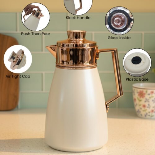 Off-white 1 Litre thermal vacuum flask featuring a rose gold handle, air-tight cap, and push-to-pour button.