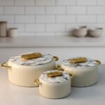 3 piece luxury off white hot pot set with marble finish lids and gold handles in 2L, 4L, and 6.5L sizes