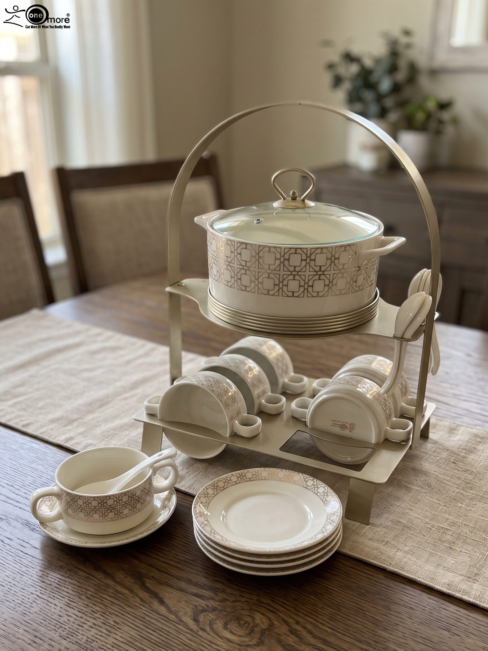 2 Luxury white and gold geometric pattern ceramic soup tureen set with matching mugs, spoons, and silver metallic rack on a marble kitchen counter