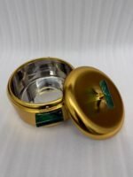 Three-piece luxury brushed gold insulated hot pot set with emerald green handles displayed on a marble kitchen countertop