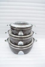 3-piece stacked luxury insulated hot pot casserole set in dark brown with silver chrome trim on a dining table setup.