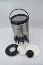 DAY DAYS 9.5 Liter stainless steel insulated hot and cold beverage dispenser with dual spigots on a countertop