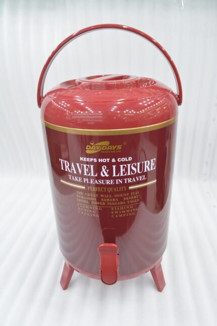 Red DAY DAYS 9.5 liter insulated portable water cooler jug with dispenser tap and foldable legs on a wooden picnic table.