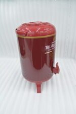 Red DAY DAYS 9.5 liter insulated portable water cooler jug with dispenser tap and foldable legs on a wooden picnic table.