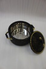 3-piece black marble insulated hot pot casserole set with gold handles on a white marble countertop