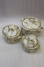 ONEMORE 3-piece luxury white and gold marble pattern hot pot set with gold handles on a marble kitchen countertop.