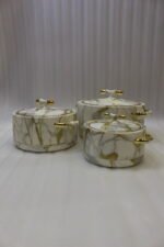 ONEMORE 3-piece luxury white and gold marble pattern hot pot set with gold handles on a marble kitchen countertop.