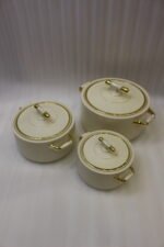 ONEMORE 3 piece off-white and gold insulated hot pot set in 1L, 2L, and 3.5L sizes displayed on a marble kitchen counter.
