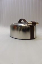 Set of three brushed stainless steel insulated hot pots with leather-look handles on a wooden table