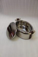Set of three brushed stainless steel insulated hot pots with leather-look handles on a wooden table